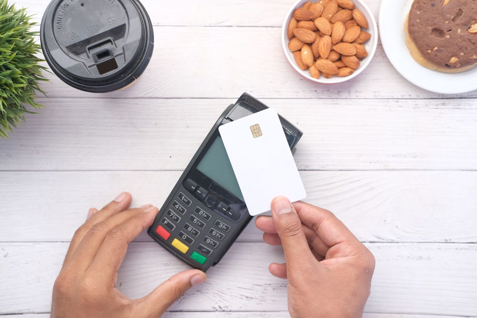 Card being used at a payment terminal