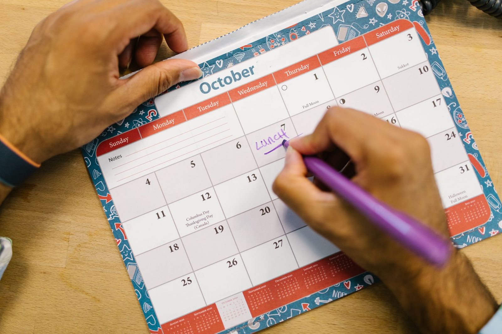 Hand writing on a monthly calendar